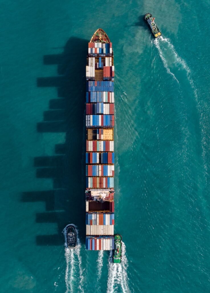 aerial view container cargo ship maritime freight 2026 01 06 11 08 02 utc scaled e1771165569805